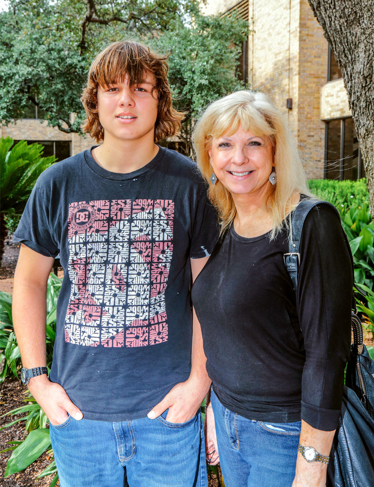 Photo of Jacob and his mother, Jill, standing outside.