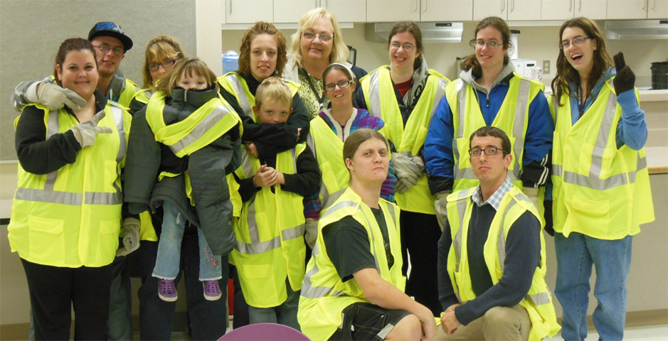 Photo of Check and Connect students dressed for community cleanup service learning.